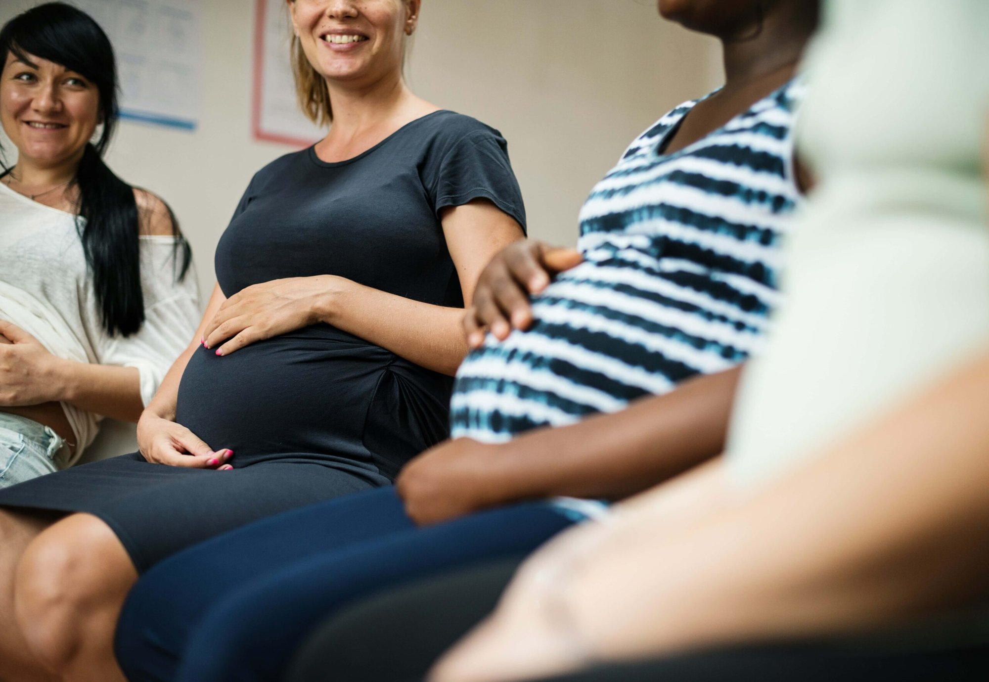 A group seated in a circle during an antenatal class